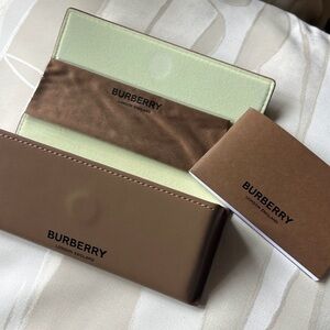 Burberry Beige Leather sunglasses case. Dust cleaner and booklet.